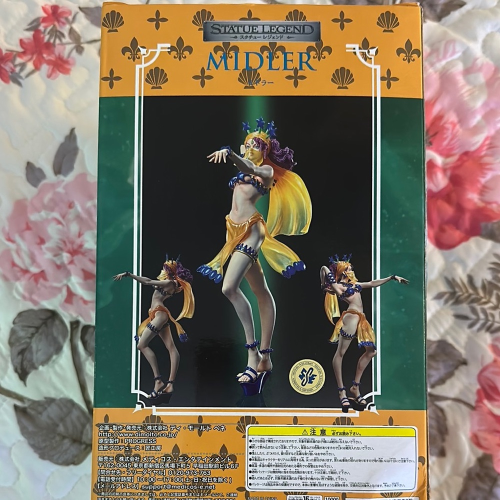 Mythical Dancer Figure with Vibrant Outfit